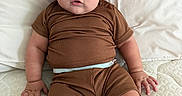 Liam Gabriel joined the competition — help win amazing prizes! baby, blue_eyes, brown_clothing, casual, child, chubby_cheeks, curious, cute, fabric, hat, indoors, infant, light, mattress, pillow, portrait, sitting, soft, striped_hat, young_child