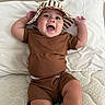 Liam Gabriel joined the competition — help win amazing prizes! baby, bed, brown_outfit, child, cute, happy, hat, indoor, infant, mattress, mouth_open, person, pillow, playful, portrait, quilted, raised_arms, skin, smiling, striped_hat