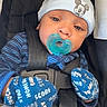 baby, infant, pacifier, blue_hat, mittens, car_seat, blanket, striped_clothing, child, cute, face, headwear, safety_harness, comfort, indoor, portrait, young_child, apparel, baby_clothes, resting