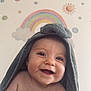 Wren joined the competition — help win amazing prizes! baby, child, smiling, towel, hooded_towel, face, portrait, indoors, rainbow, wall_art, sun, cloud, dots, happy, cute, skin, eyelashes, expression, infant, head