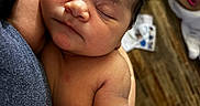 Lilly is registered to the contest to win money with this photo: baby, bare_skin, caregiver, close_up, cozy, cuddling, diaper, face, family, hair, hand, hospital, indoors, infant, newborn, parenting, peaceful, photography, portrait, sleeping