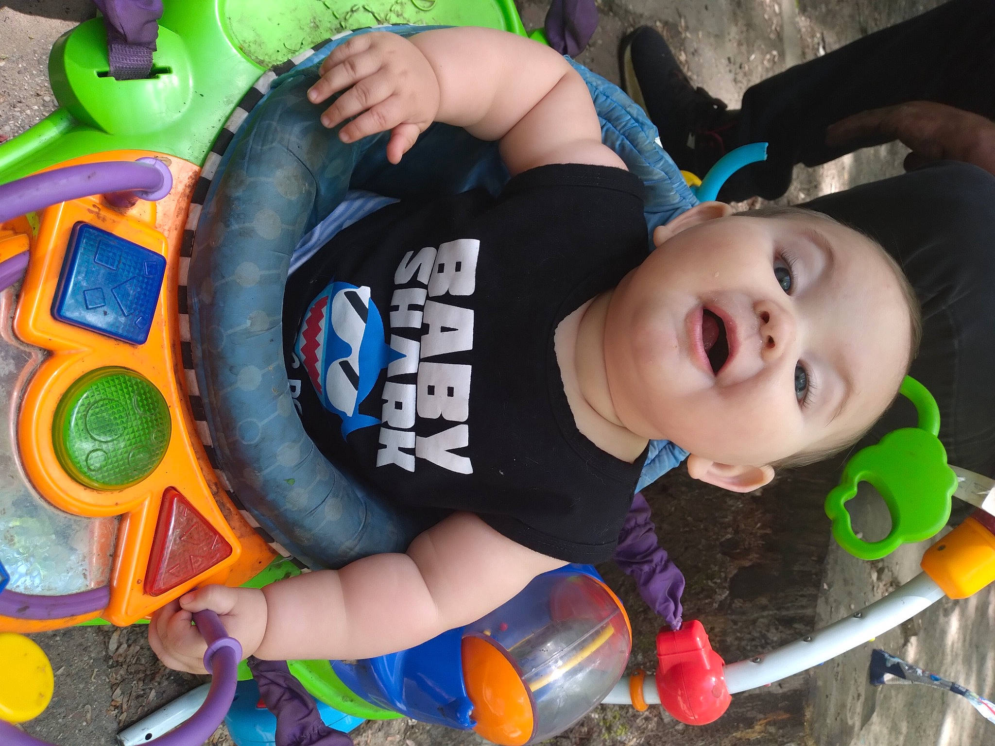 James is registered to the contest to win money with this photo: baby, baby_playing_with_toys, baby_products, baby_toddler_clothing, beauty, child, facial_expression, fun, grass, green, happy, leisure, mammal, orange, person, recreation, smile, snapshot, toddler, toy