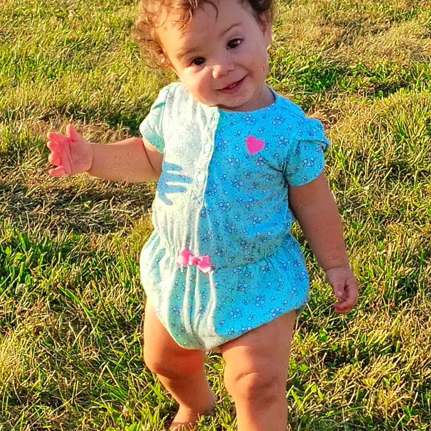 Journee is registered to the contest to win money with this photo: child, clothing, dress, face, female, field, girl, grass, head, lawn, nature, outdoors, person, photography, plant, portrait, shorts, summer, t_shirt, yard