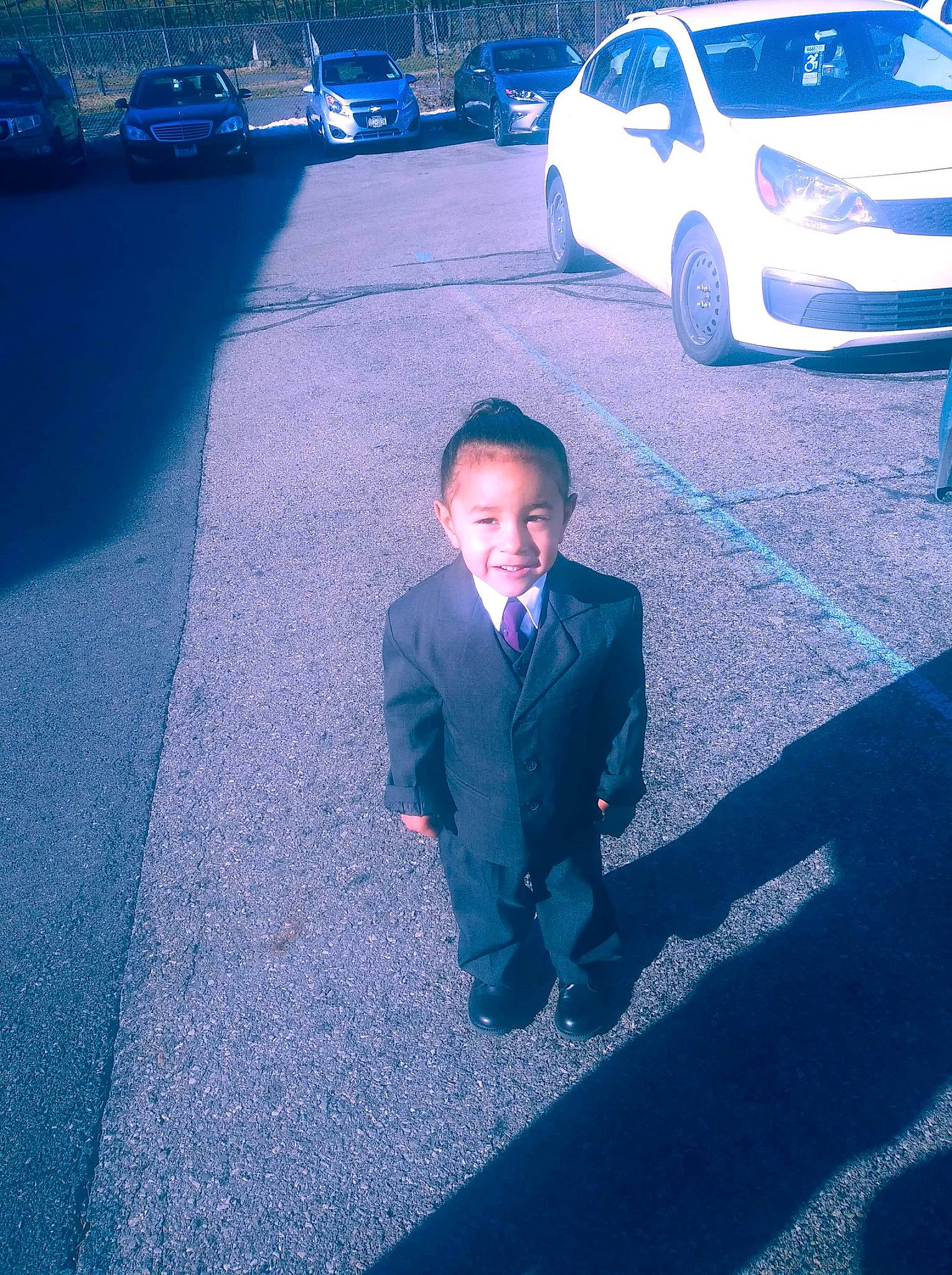 Jackson is registered to the contest to win money with this photo: asphalt, blue, car, city_car, cloud, compact_car, electric_blue, family_car, hatchback, joy, luxury_vehicle, mid_size_car, minivan, pedestrian, person, road, road_surface, sky, street, vacation