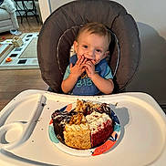 Connor joined the competition — help win amazing prizes! baby, cream, cutlery, dessert, diningtable, dish, face, food, fork, furniture, head, icing, lunch, meal, person, photography, portrait, spoon, sweets, table