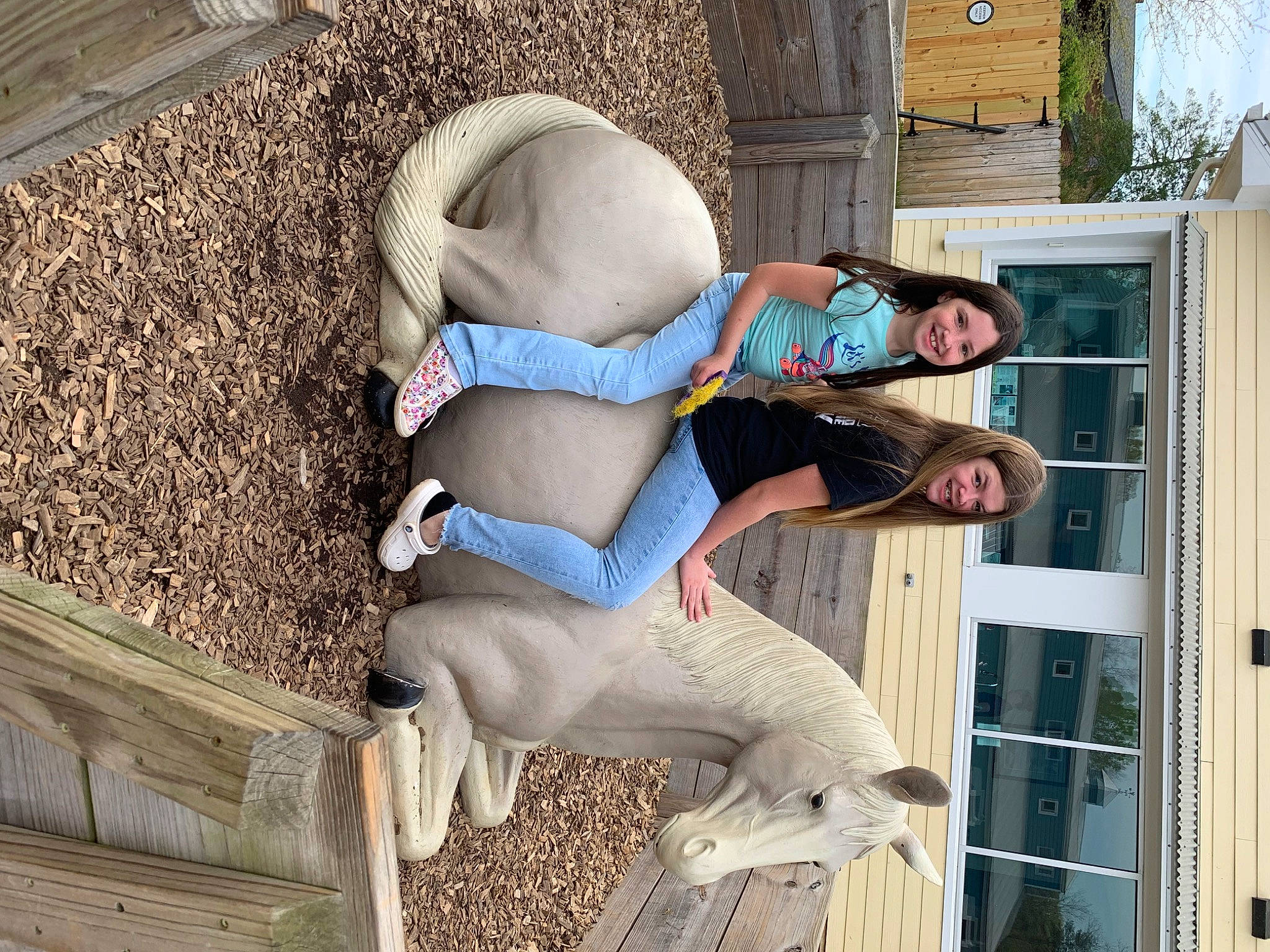 Aubree is registered to the contest to win money with this photo: fun, fur, human_leg, joy, leisure, person, sitting, smile, soil, street_fashion, thigh, vacation, wood