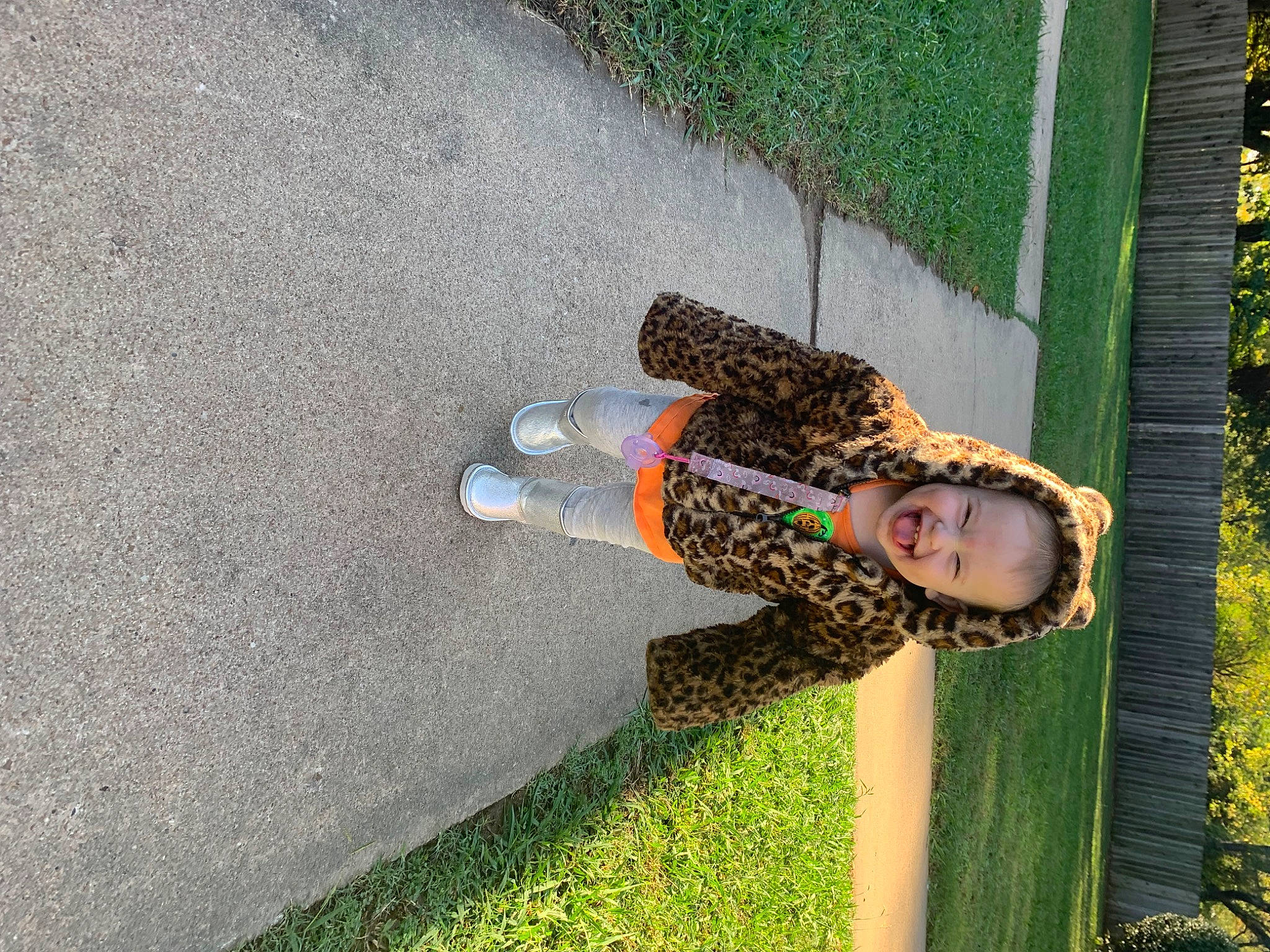 Bryleigh joined the competition — help win amazing prizes! asphalt, concrete, fun, grass, happy, human_leg, leisure, pattern, people_in_nature, person, plant, recreation, road_surface, shadow, sidewalk, soil, tar, walking_shoe