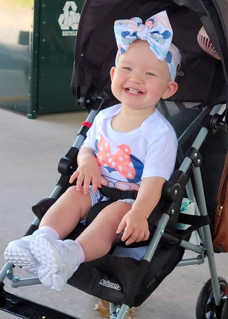 Harper joined the competition — help win amazing prizes! baby, baby_carriage, baby_products, baby_toddler_clothing, child, door, electric_blue, eye, face, fun, goggles, hat, headwear, joy, leg, person, smile, snapshot, thigh, tire