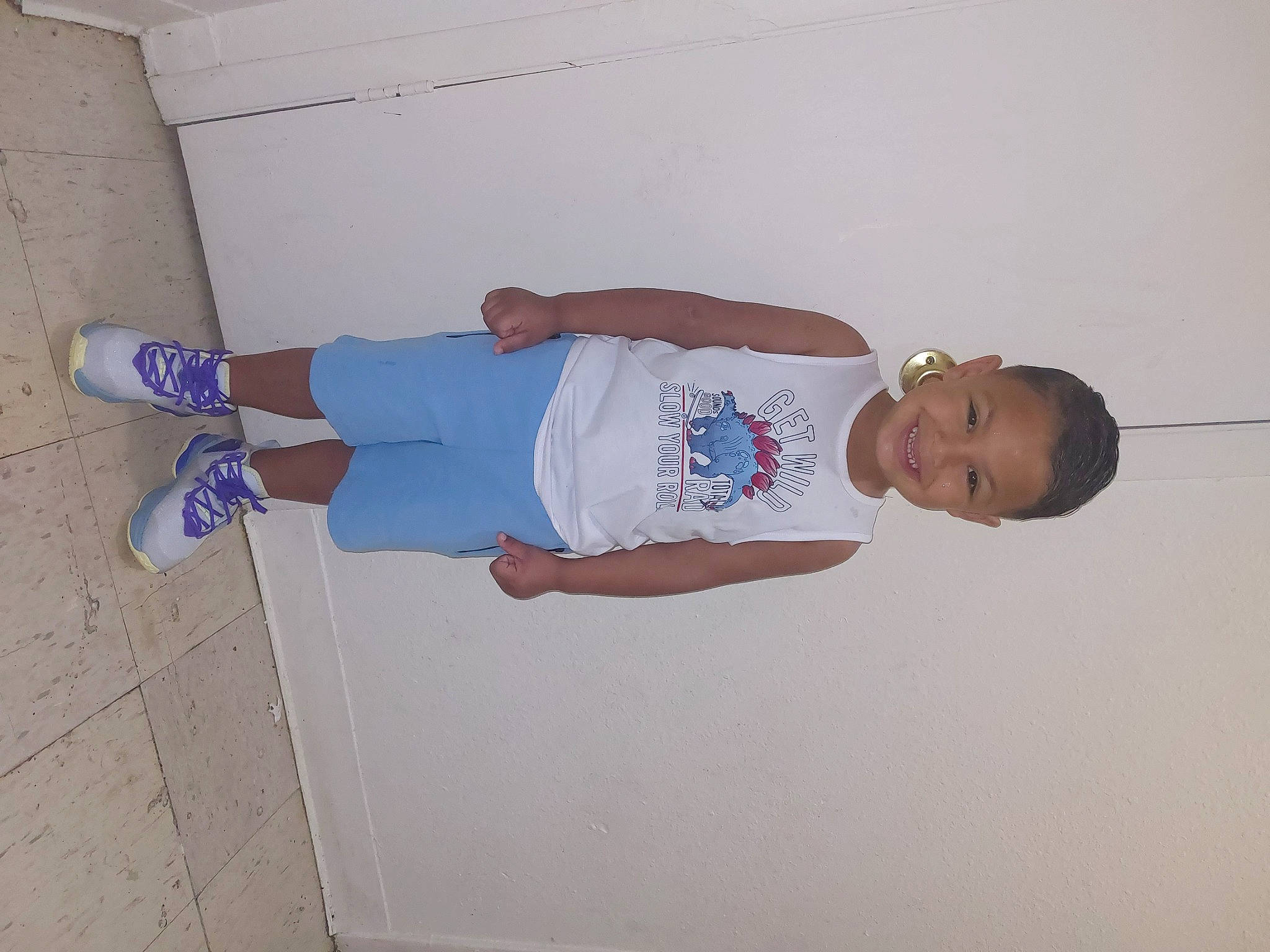Nehemiah joined the competition — help win amazing prizes! baby, baby_toddler_clothing, child, cleanliness, elbow, electric_blue, foot, human_leg, joy, knee, pattern, person, sandal, sleeve, smile, t_shirt, thigh, toddler, walking_shoe, wrist
