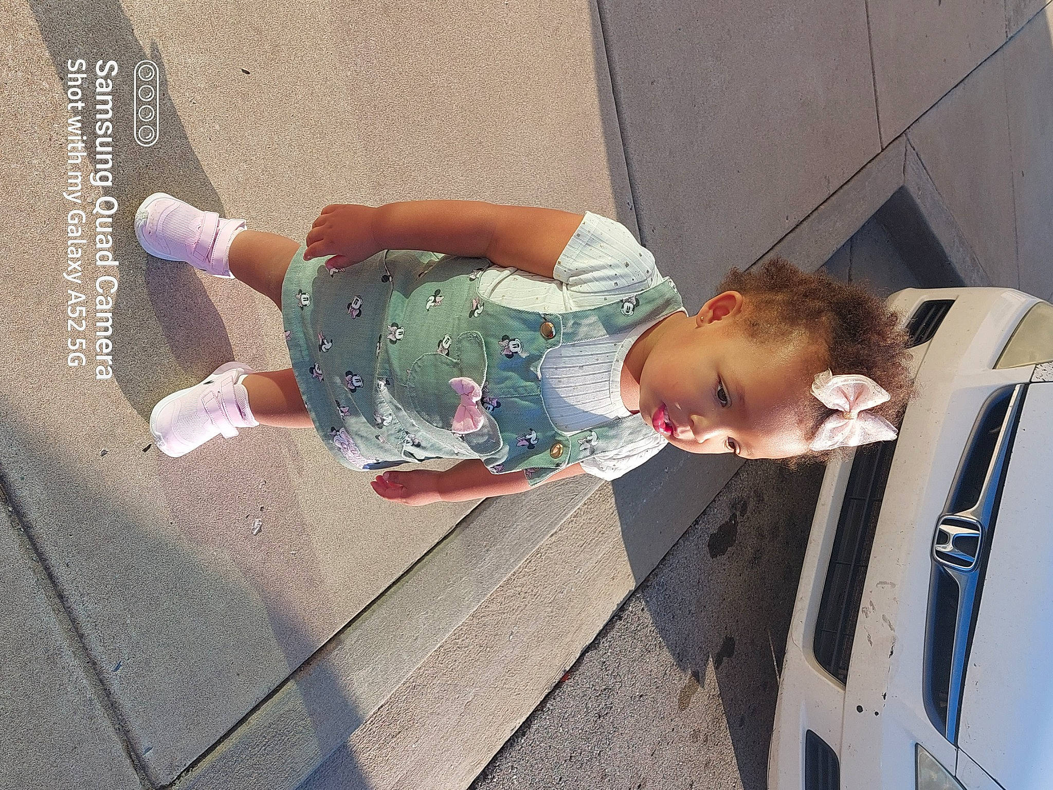 Mariana is registered to the contest to win money with this photo: automotive_design, automotive_exterior, automotive_lighting, automotive_window_part, baby, bumper, car, child, door, family_car, fun, hand, hood, human_leg, motor_vehicle, person, thigh, toddler, vehicle, vehicle_door