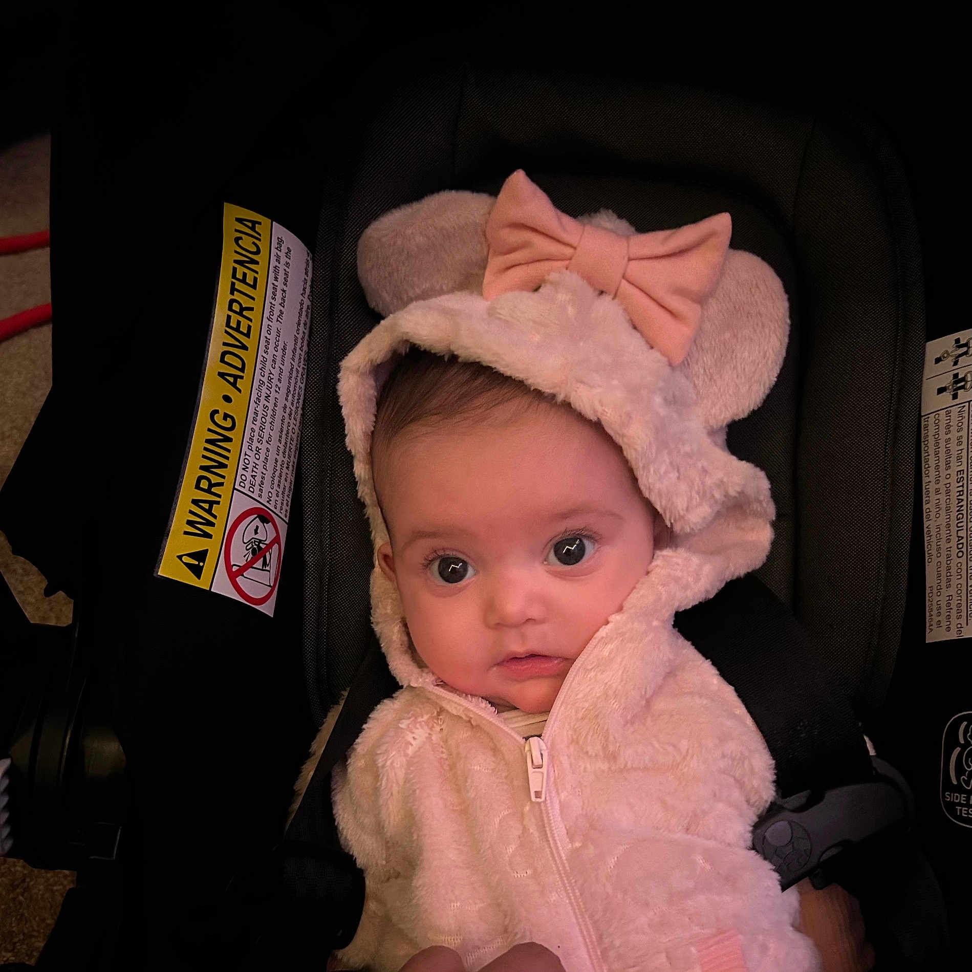 Hazel is registered to the contest to win money with this photo: baby, bonnet, cap, car, clothing, coat, face, hat, head, hood, hoodie, jacket, knitwear, person, photography, portrait, sweater, sweatshirt, transportation, vehicle