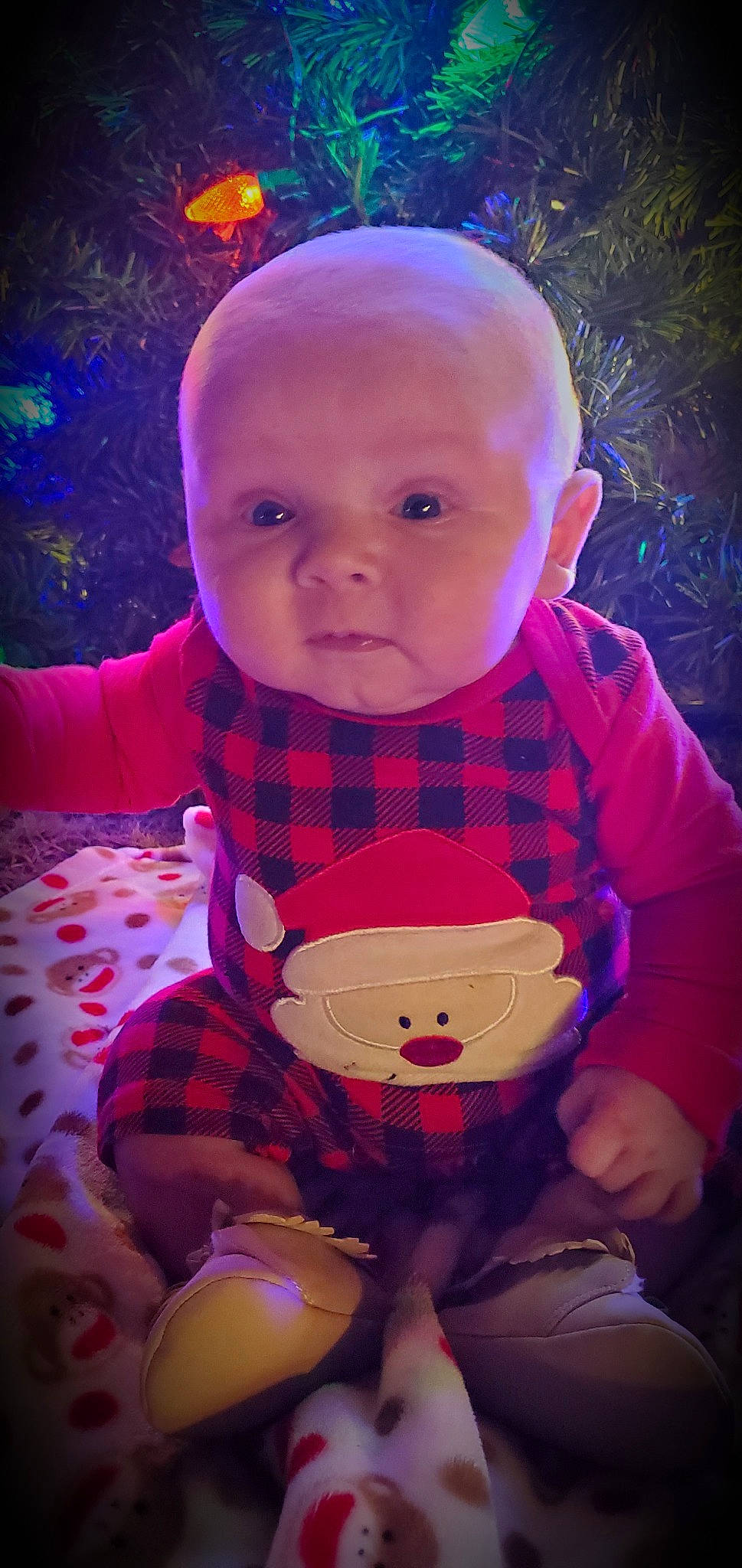 Ryker is registered to the contest to win money with this photo: baby, baby_toddler_clothing, cheek, cool, fun, happy, light, lip, magenta, mouth, orange, organ, outerwear, person, pink, plaid, purple, skin, sleeve, textile