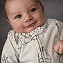 baby, infant, face, smile, eyes, onesie, clothing, soft, cute, portrait, child, young, happy, skin, head, human, expression, cozy, indoors, closeup