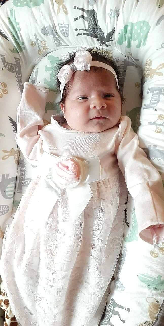 Sumaya joined the competition — help win amazing prizes! baby, baby_products, baby_safety, baby_toddler_clothing, cheek, comfort, eye, eyelash, fashion_accessory, happy, head, headgear, human_body, linens, pattern, person, pink, skin, sleeve, toddler