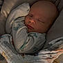 baby, sleeping, blanket, pillow, infant, cozy, bedtime, soft, peaceful, child, cute, snuggled, clothing, indoors, resting, toddler, warm, comfort, face, portrait