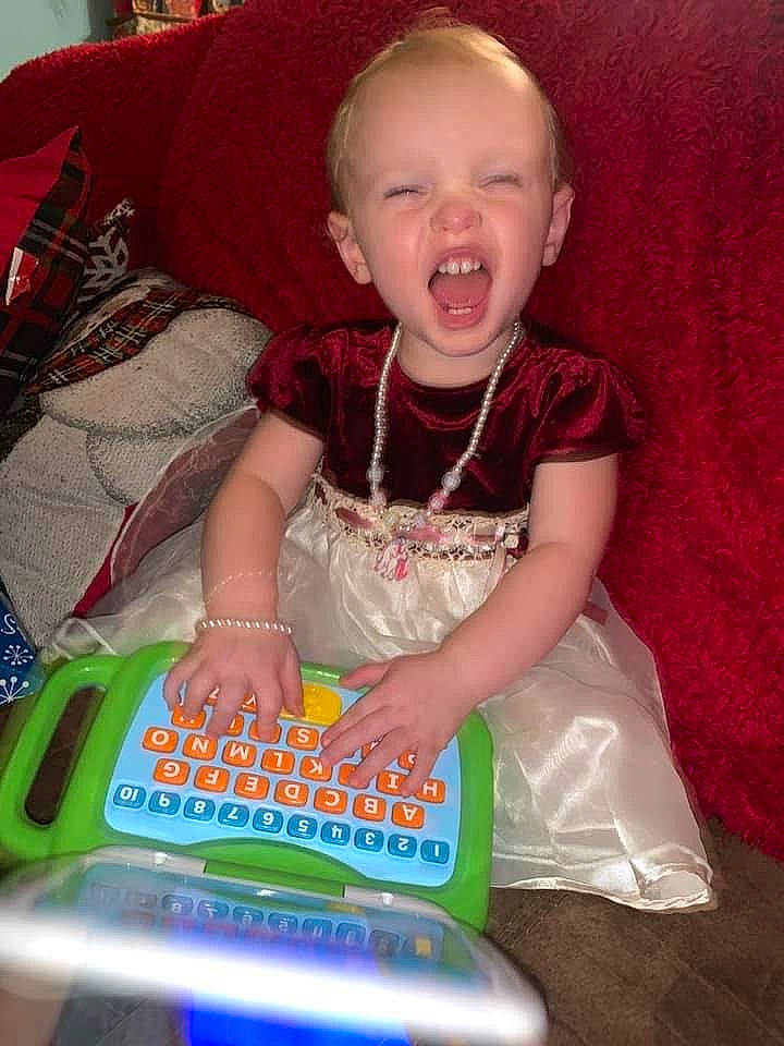 Elizabeth joined the competition — help win amazing prizes! arm, baby, baby_carriage, baby_playing_with_toys, baby_products, baby_toddler_clothing, baby_toys, child, comfort, fun, happy, lap, magenta, person, pink, product, sitting, smile, textile, toddler