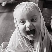 Owen joined the competition — help win amazing prizes! toddler, child, smiling, laughing, face, portrait, indoor, cloth, wrapped, happy, baby, cute, hand, ring, head_covering, black_and_white, close_up, expression, person, joy
