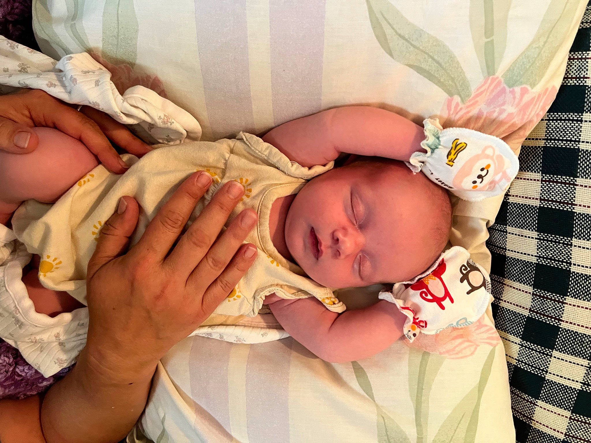 Baylor is registered to the contest to win money with this photo: arm, baby, baby_products, baby_sleeping, baby_toddler_clothing, child, comfort, event, eyelash, finger, hand, happy, linens, nail, pattern, people, person, room, skin, thumb