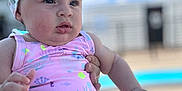 Anyelina Antonella is registered to the contest to win money with this photo: baby, child, swimsuit, headband, bow, outdoor, pool, summer, person, infant, cute, pink, clothing, portrait, skin, hand, face, nature, daylight, background