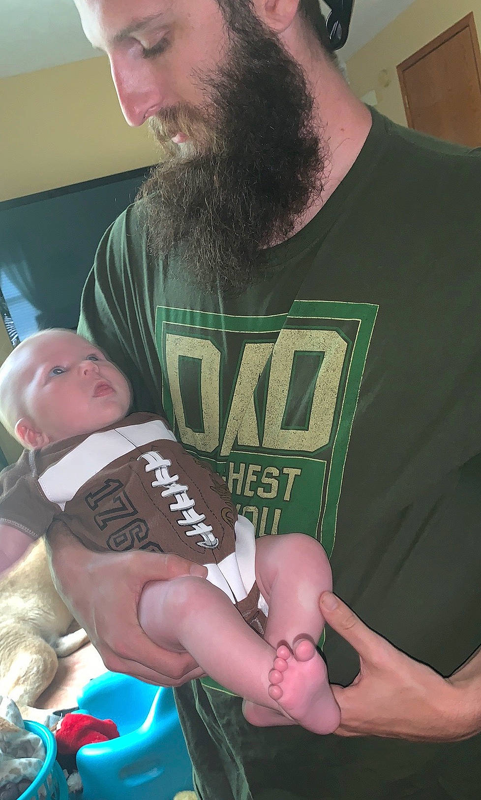 Greyson is registered to the contest to win money with this photo: arm, child, elbow, hand, muscle, person, t_shirt, thumb, toddler