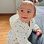 Aylin-Ayla a rejoint le concours — aidez-le/la à gagner de superbes lots ! bed, child, curtain, face, floor, hand, happy, home, hoodie, indoor, leggings, person, pigtails, radiator, smile, socks, toddler, toy, white_clothing, window