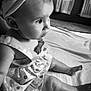 Peyton is registered to the contest to win money with this photo: baby, infant, child, dress, headband, blanket, sitting, indoors, curious, face, portrait, monochrome, black_and_white, soft_light, window, floor, room, cute, young, person