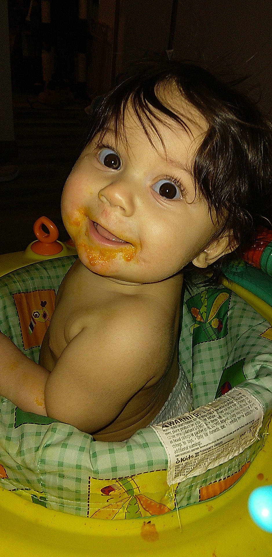 Julian is registered to the contest to win money with this photo: bangs, black_hair, cheek, chest, child, eyelash, forehead, happy, human_body, iris, jaw, lip, mouth, neck, nose, pattern, person, plaid, skin, tartan