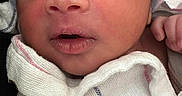 Noel joined the competition — help win amazing prizes! newborn, baby, infant, wrapped, blanket, hat, beanie, face, eyes, mouth, skin, hand, clothing, cute, portrait, indoors, soft, cozy, newborn_hat, newborn_blanket