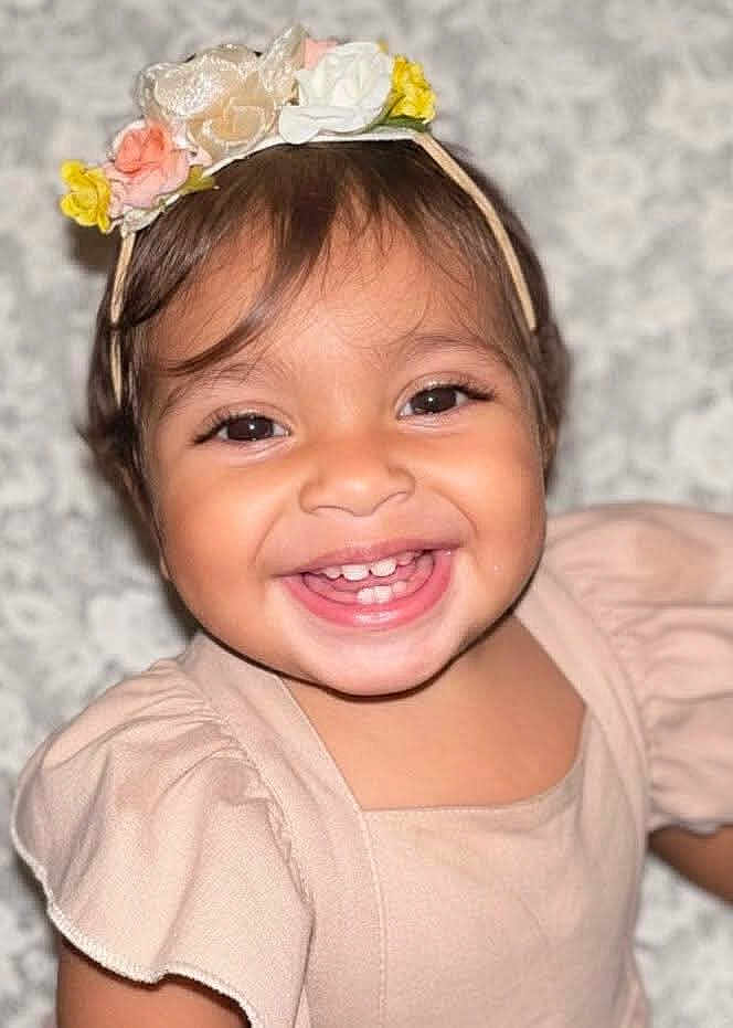 Kenzlyn joined the competition — help win amazing prizes! toddler, smiling, child, face, headband, flower, happy, cute, portrait, baby, clothing, dress, skin, eyes, hair, indoor, person, young, closeup, childhood