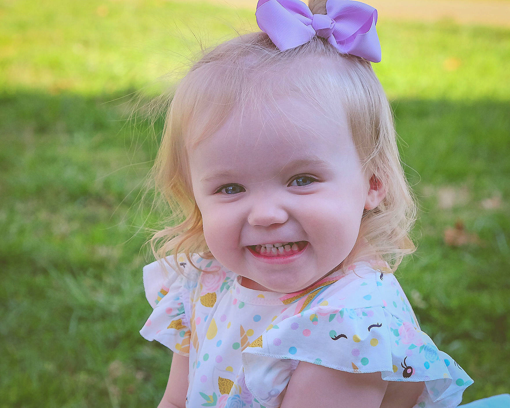 Baylee is registered to the contest to win money with this photo: baby, baby_toddler_clothing, blond, child, design, dress, face, grass, hair_accessory, head, joy, lip, pattern, person, pink, polka_dot, skin, smile, spring, summer