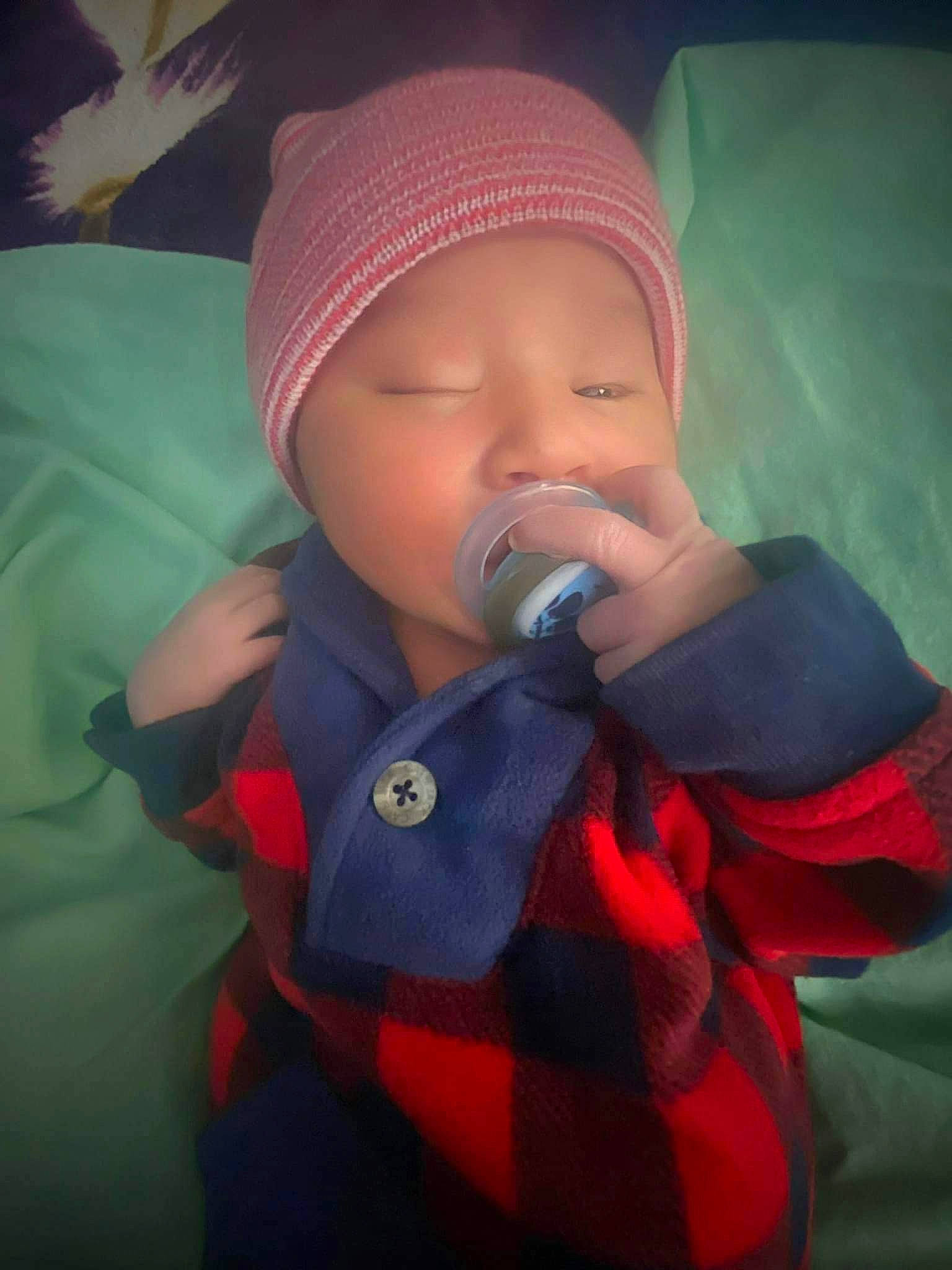 Roman is registered to the contest to win money with this photo: baby, cap, carmine, cheek, chin, cloud, drinkware, eye, eyebrow, fashion_accessory, fun, happy, hat, headwear, helmet, jacket, lip, mouth, nose, person