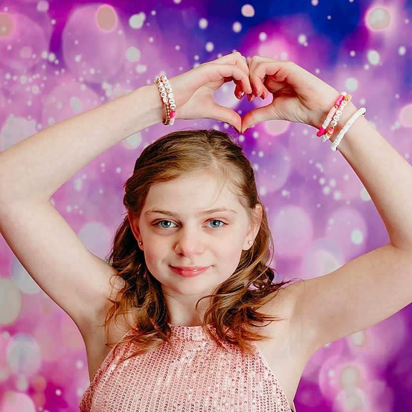 Raina joined the competition — help win amazing prizes! accessories, bodypart, child, clothing, dress, eveningdress, face, female, finger, girl, hand, happy, head, jewelry, loveheartsymbol, person, photography, portrait, smile, symbol