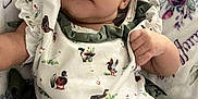Berkleigh is registered to the contest to win money with this photo: baby, birds, blanket, child, closeup, clothing, cute, dress, ducks, eyes, face, floral, hand, indoors, infant, laying, pattern, portrait, skin, young