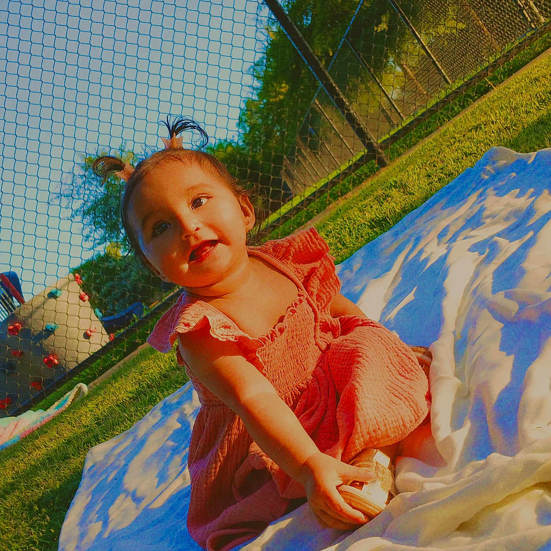 Ailani joined the competition — help win amazing prizes! baby, backyard, clothing, dress, face, furniture, grass, head, lawn, nature, outdoorplayarea, outdoors, park, person, photography, plant, playarea, portrait, summer, yard