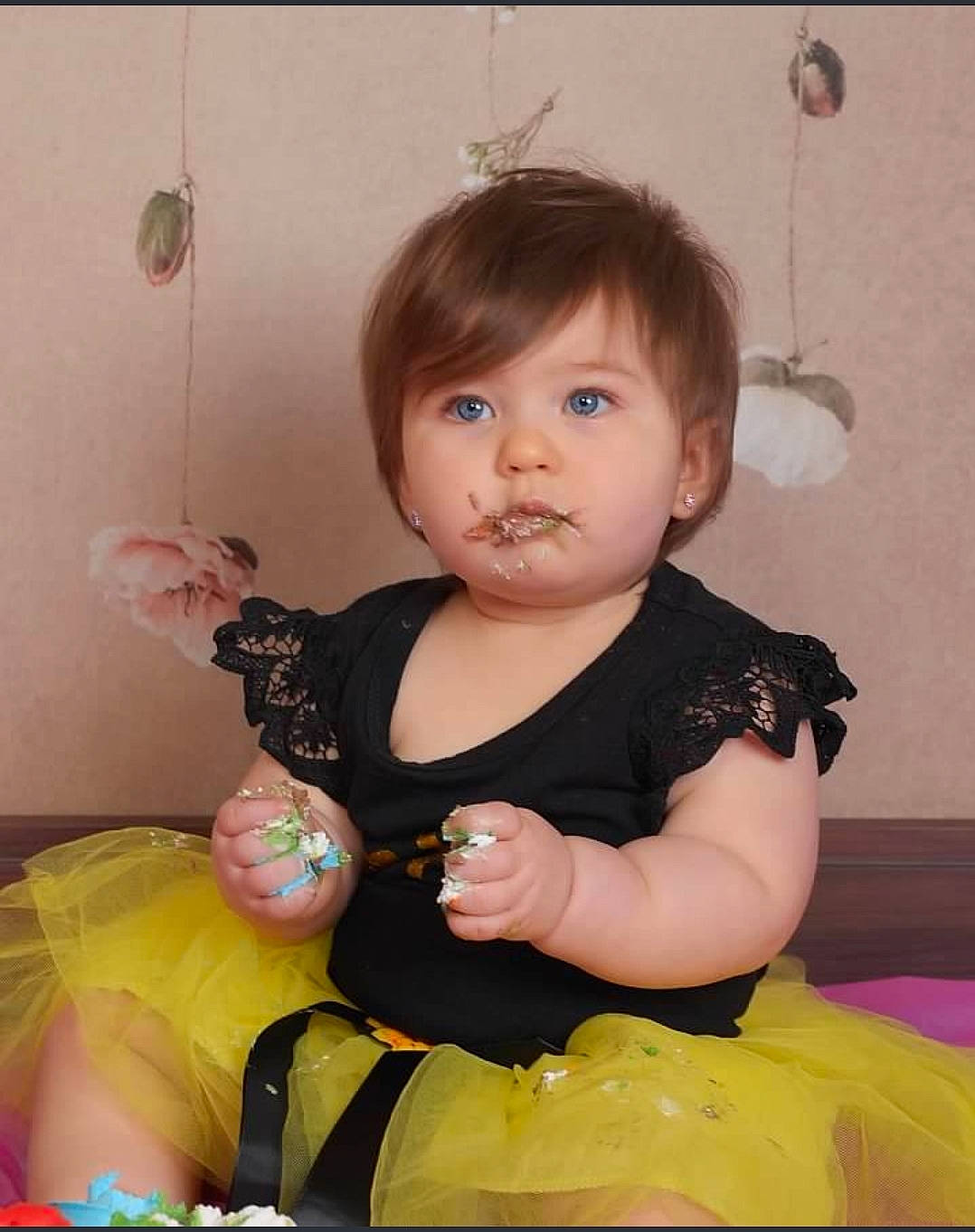 Annabelle is registered to the contest to win money with this photo: arm, baby, baby_toddler_clothing, cheek, child, eye, face, finger, fun, gesture, hair, happy, neck, person, pink, skin, sleeve, t_shirt, thumb, toddler