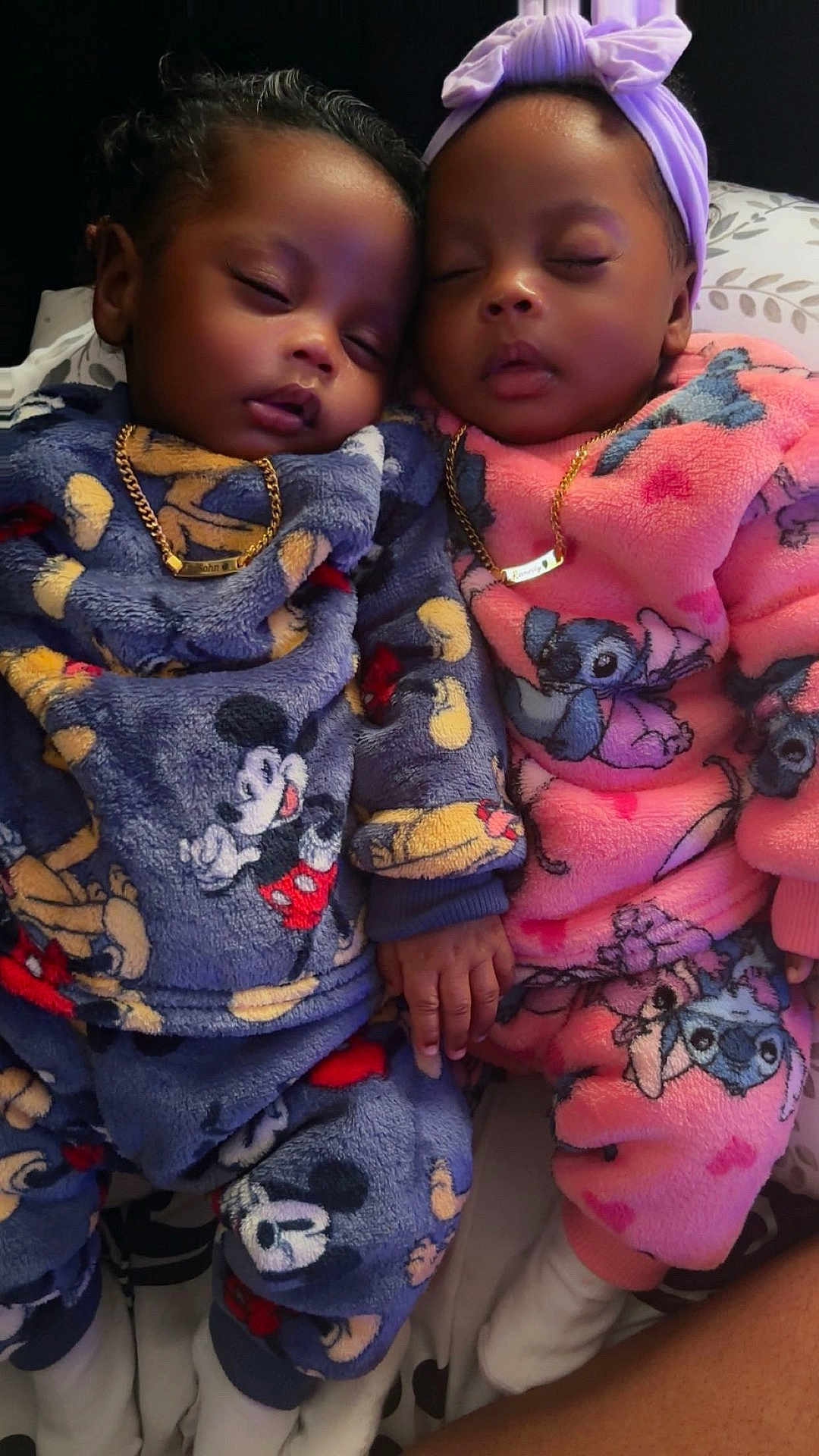 Rasohn-Remedy is registered to the contest to win money with this photo: toddler, sleeping, pajamas, mickey_mouse, stitch, gold_chain, headband, hand_holding, bed, blanket, child, cute, cozy, indoor, portrait, peaceful, clothing, face, people, infant