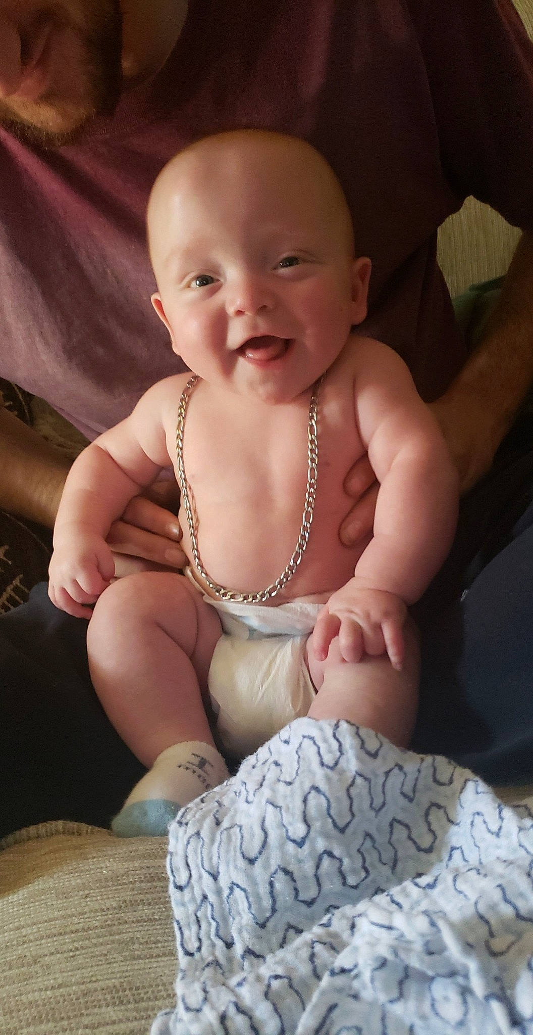 Jeffery James is registered to the contest to win money with this photo: abdomen, arm, baby, baby_toddler_clothing, chest, comfort, face, facial_expression, finger, hand, happy, knee, mouth, neck, person, skin, smile, stomach, thigh, toddler