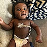 Aayan joined the competition — help win amazing prizes! baby, diaper, pacifier, blanket, couch, infant, child, person, indoors, cute, smiling, skin, hair, expression, lying_down, fabric, texture, comfort, home, young