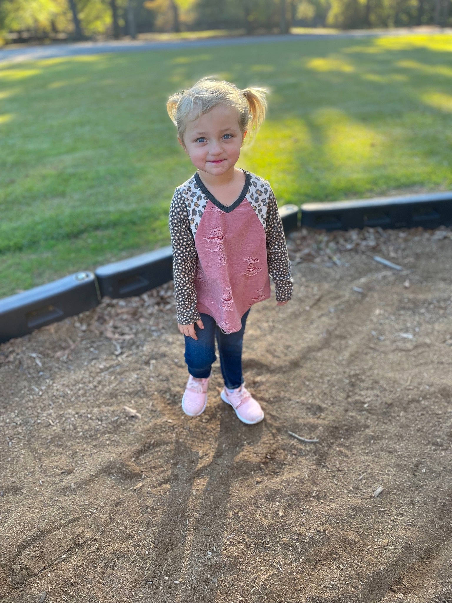 Avery Kate is registered to the contest to win money with this photo: asphalt, child, eye, face, fun, grass, grass_family, hairstyle, happy, human_body, joy, landscape, lawn, leg, leisure, people_in_nature, person, plant, recreation, road_surface