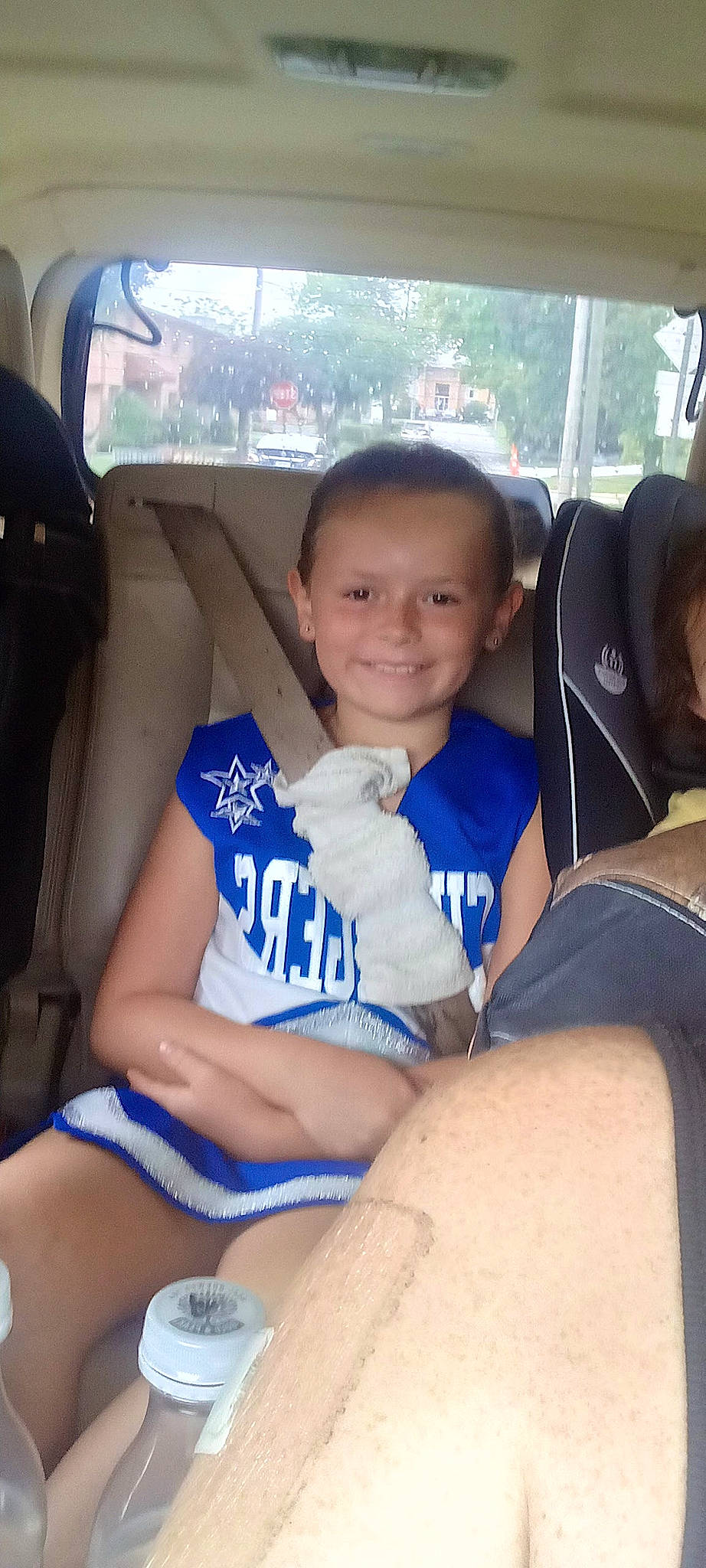 Andrea Lucille joined the competition — help win amazing prizes! auto_part, automotive_design, automotive_exterior, black_hair, car_seat, car_seat_cover, facial_expression, finger, fun, happy, head_restraint, joy, knee, leisure, motor_vehicle, person, smile, steering_wheel, thigh, thumb