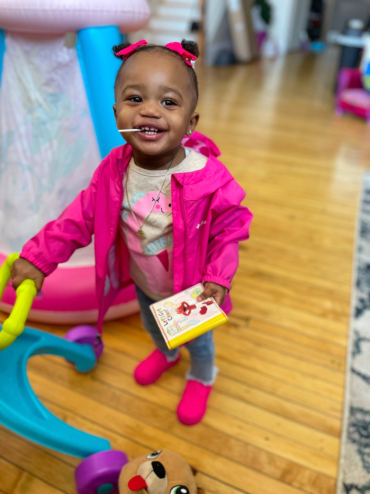 Avah is registered to the contest to win money with this photo: child, finger, flooring, fun, green, happy, head, joy, leisure, organ, people, person, photograph, pink, purple, red, skin, smile, toddler, toy