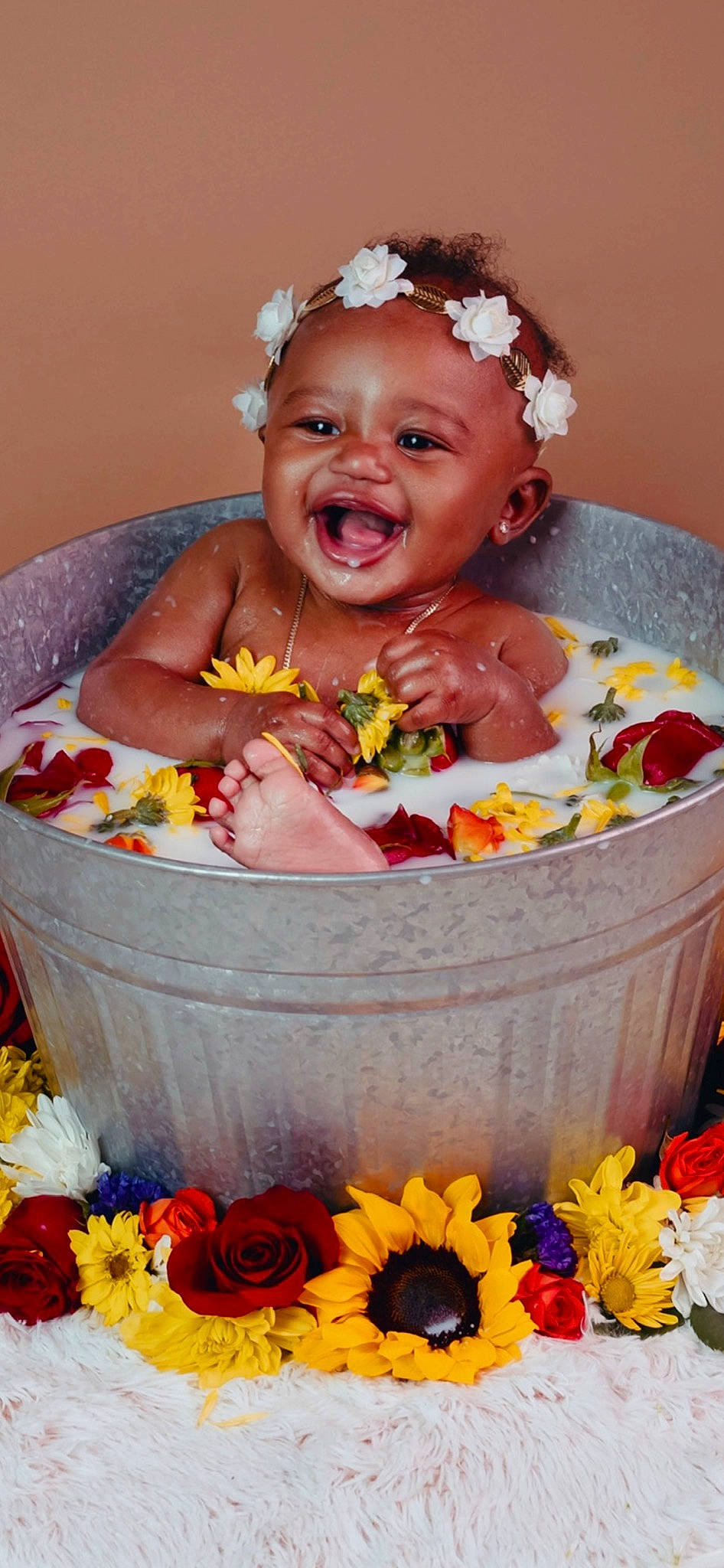 Avah is registered to the contest to win money with this photo: artificial_flower, baby, baby_toddler_clothing, beauty, child, cut_flowers, event, floristry, flower, flower_arranging, happy, jewellery, person, petal, plant, product, rose, smile, sweetness, toddler