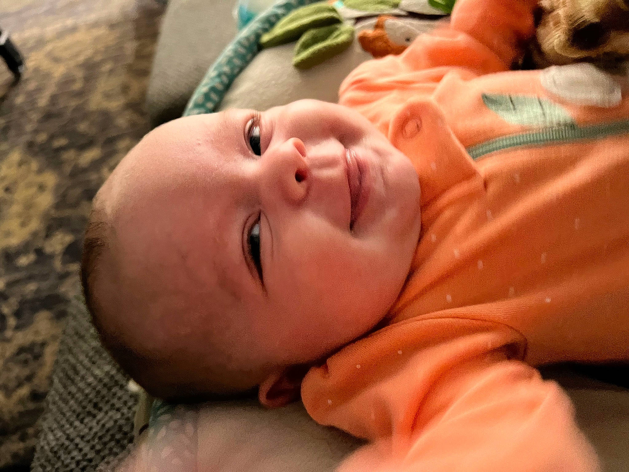 Caroline is registered to the contest to win money with this photo: baby, baby_products, baby_toddler_clothing, cheek, child, close_up, comfort, eyelash, facial_expression, fun, grass, mouth, nose, person, personal_protective_equipment, room, skin, sleep, toddler, tree