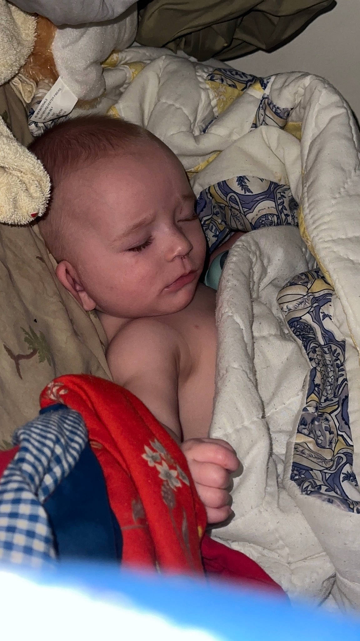 Kyran is registered to the contest to win money with this photo: baby, baby_products, baby_sleeping, baby_toddler_clothing, bedtime, cheek, child, comfort, finger, human, iris, linens, mammal, mouth, person, product, sitting, skin, textile, toddler