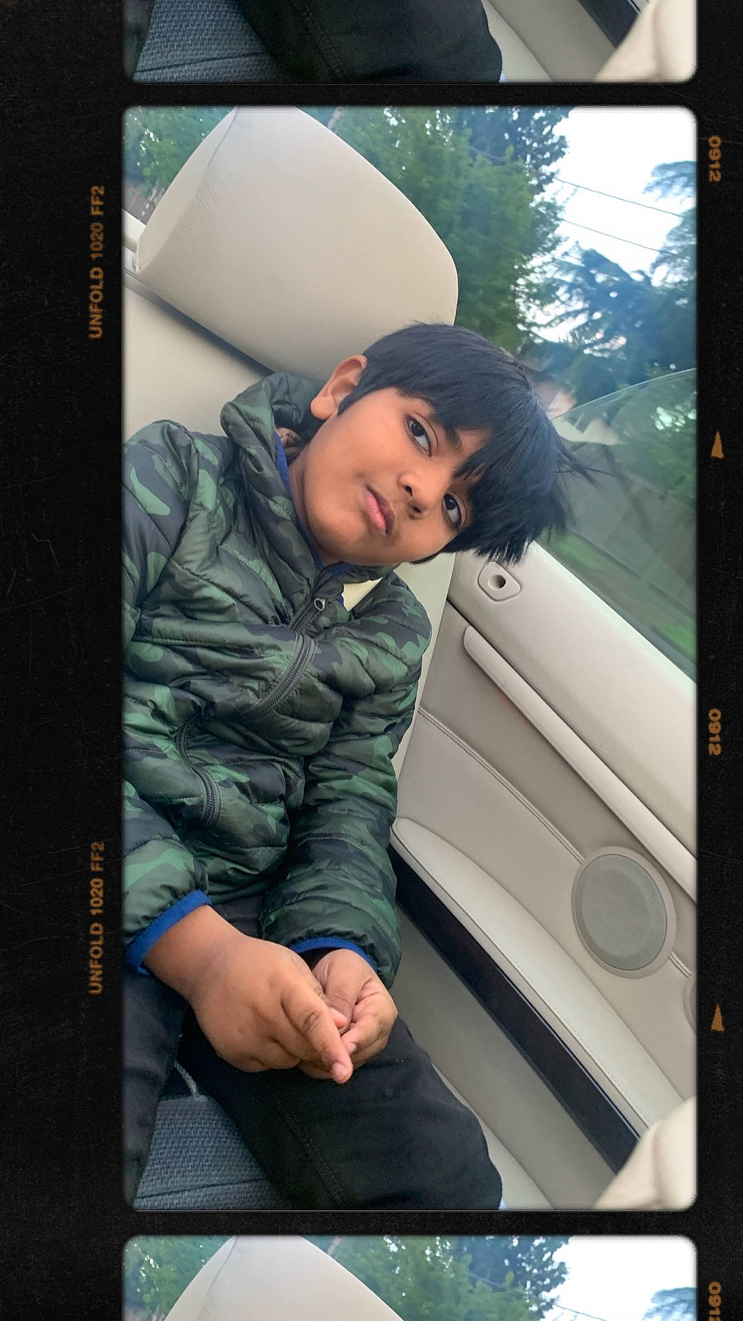 Vivaan is registered to the contest to win money with this photo: auto_part, automotive_design, automotive_window_part, car_seat, comfort, cool, display_device, electronic_device, facial_expression, family_car, flash_photography, fun, gadget, luxury_vehicle, person, room, sitting, sleeve, tints_and_shades, tree