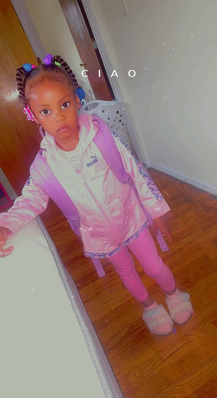 Saveah is registered to the contest to win money with this photo: baby, baby_toddler_clothing, barefoot, child, flooring, foot, happy, hardwood, human_leg, knee, magenta, person, pink, purple, room, sleeve, sock, thigh, toddler, wood