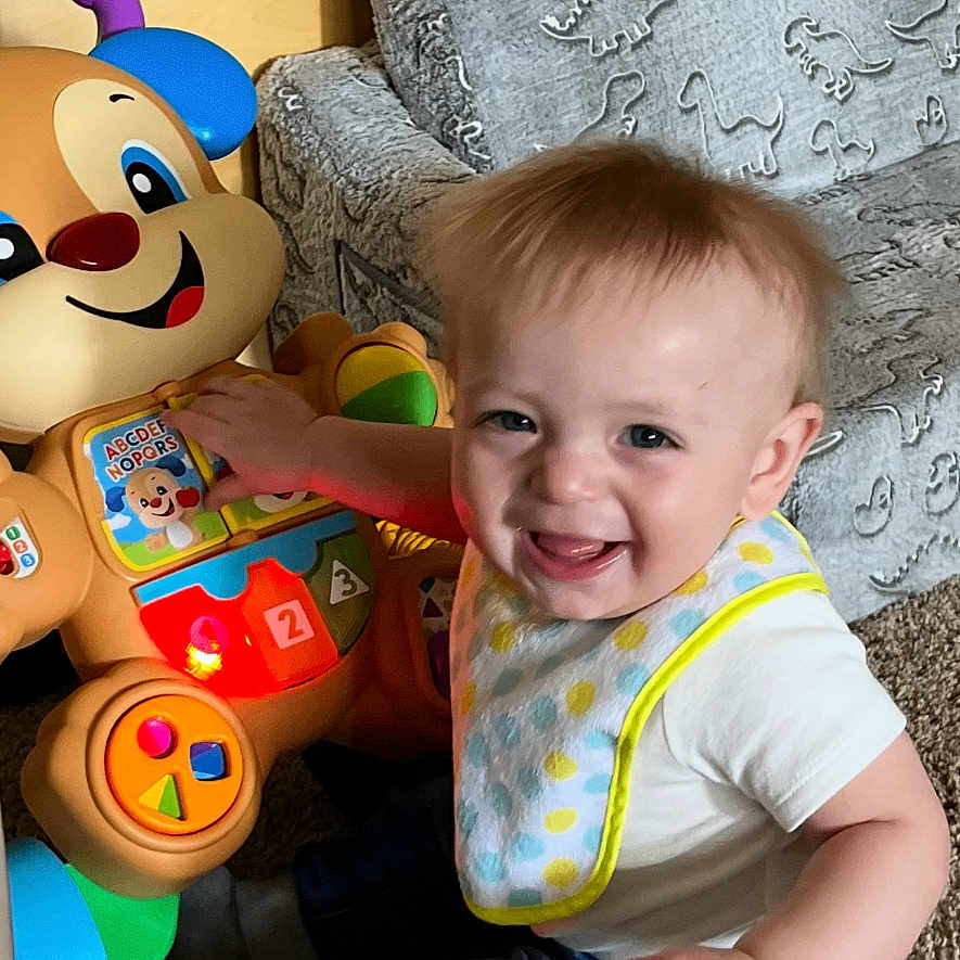 Hiro joined the competition — help win amazing prizes! baby, clothing, couch, cushion, face, furniture, happy, head, homedecor, indoors, interiordesign, laughing, pants, person, photography, portrait, sitting, smile, toy, wood