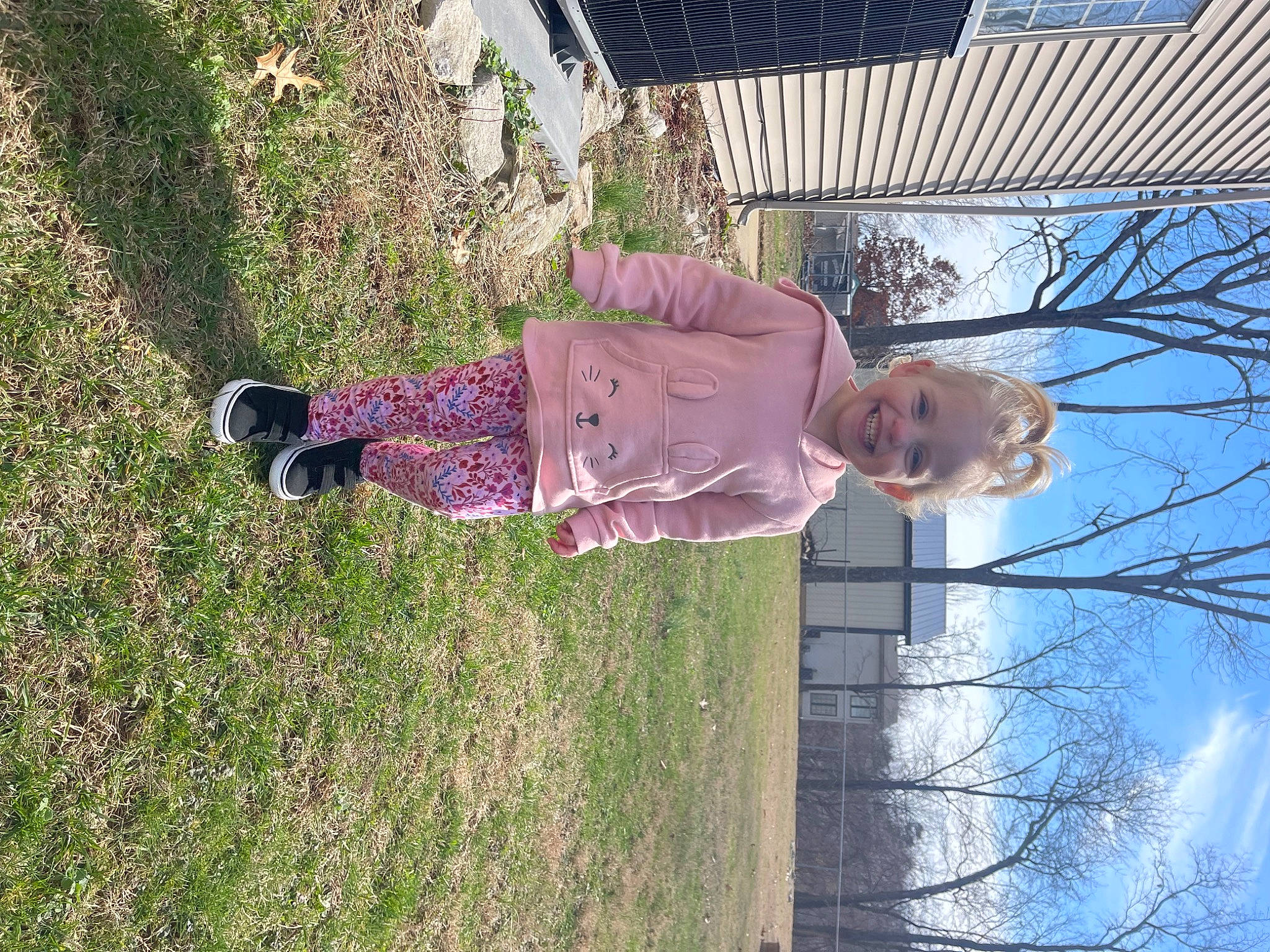 Amia is registered to the contest to win money with this photo: beauty, cloud, fun, grass, groundcover, joy, leisure, people_in_nature, person, plant, shadow, shrub, sky, smile, toddler, tree, twig, woody_plant