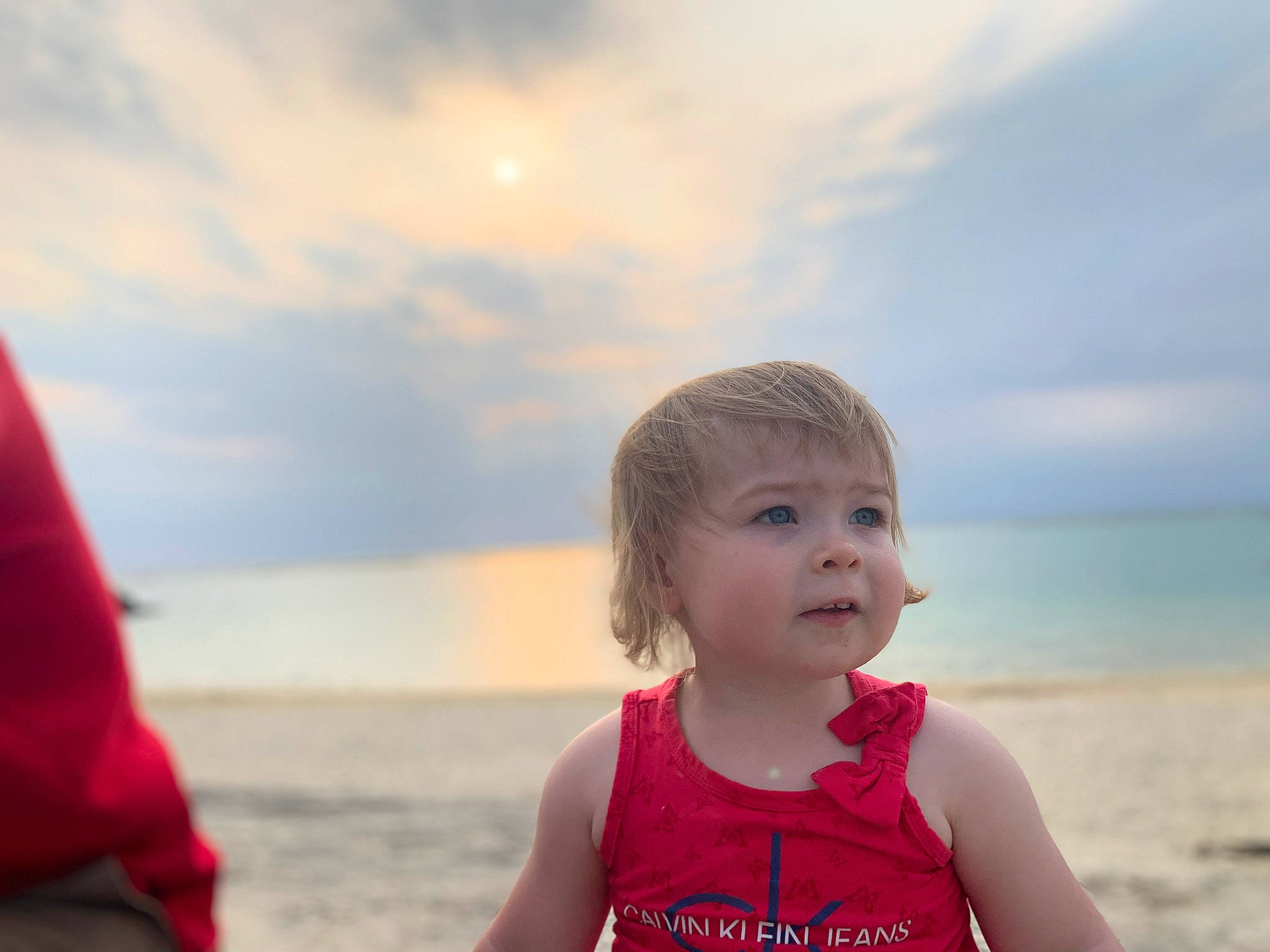 Ainsley is registered to the contest to win money with this photo: beach, child, coast, fun, happy, holiday, leisure, ocean, person, photography, red, sand, sea, sky, smile, summer, sunlight, toddler, tourism, travel