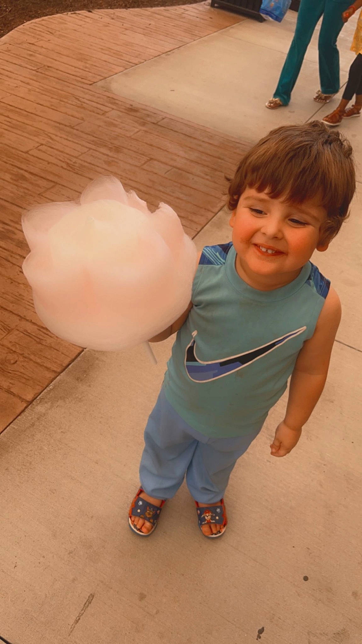 Camren is registered to the contest to win money with this photo: baby_toddler_clothing, balloon, child, cotton_candy, flooring, foot, fun, happy, joy, leisure, party_supply, person, play, recreation, sandal, sitting, sleeve, smile, t_shirt, toddler
